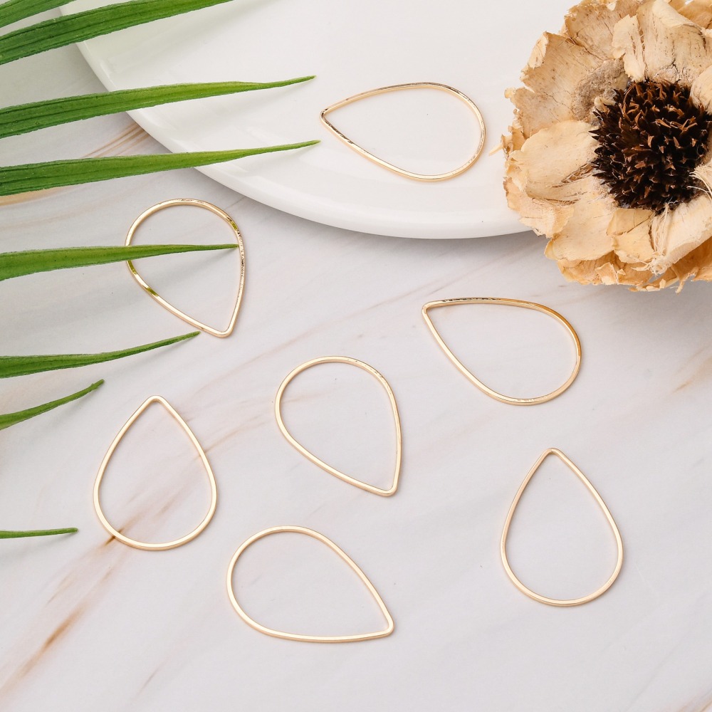 Brass Linking Rings Tropfenform goldfarbig aus Messing 32x22x1mm 1 Stück